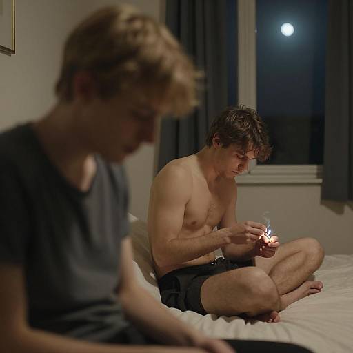 Intimate Moment in a Dim Bedroom