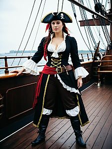 Woman in Pirate Costume Full Body Cosplay Photo on Ship Deck