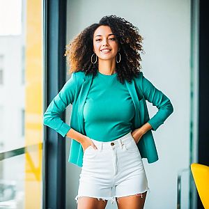 Confident Woman in Teal Outfit
