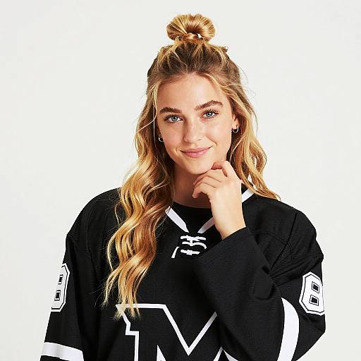 Blonde Woman in Black Hockey Jersey With Number 8