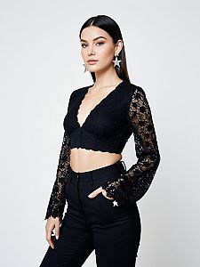 Contemporary Chic Woman in Black Lace Crop Top with Plunging Neckline
