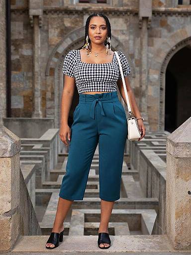 Stocky Woman Wearing Black and White Gingham Crop Top and Teal Pants Diego Fazio Style