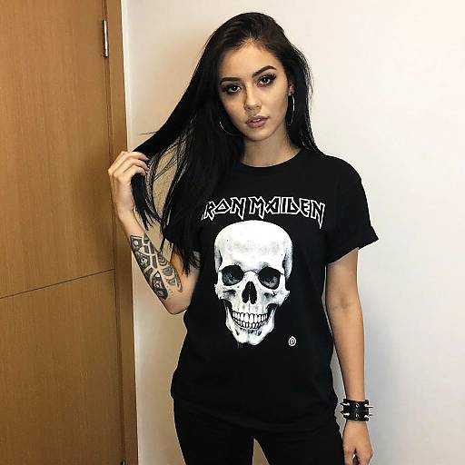 Woman Wearing Iron Maiden Skull T-Shirt with Tattoo and Spiked Bracelet