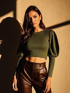 Stylish Woman in Olive Green Crop Top and Brown Leather Pants in Warm Sunlight