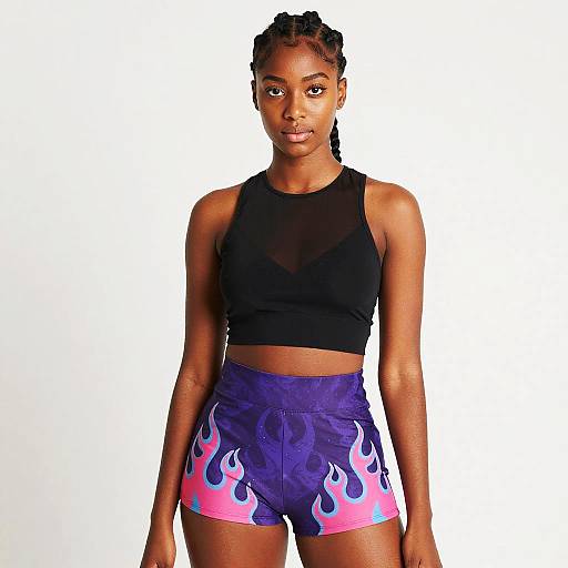 Young Woman in Stylish Black Crop Top and Purple Flame Shorts