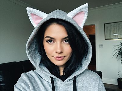 Woman in Grey Hoodie with Cat Ears Costume Close-Up Portrait
