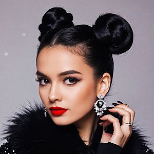 Young Woman with Black Buns and Red Lipstick