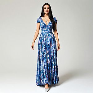 Confident Woman in Blue Maxi Dress