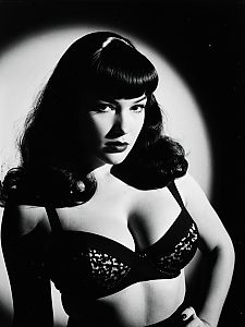Vintage Style Woman with Bettie Page Bangs in Black and White Editorial Portrait