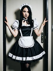 Woman in Lockable Gothic Maid Costume Full Body Cosplay Photo