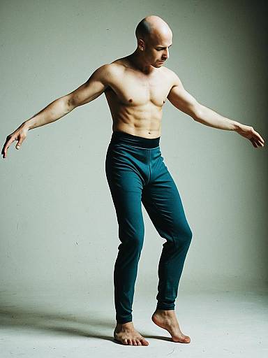 Bald Man in Full-Body Dance Costume Pose Barefoot Contemporary Dance