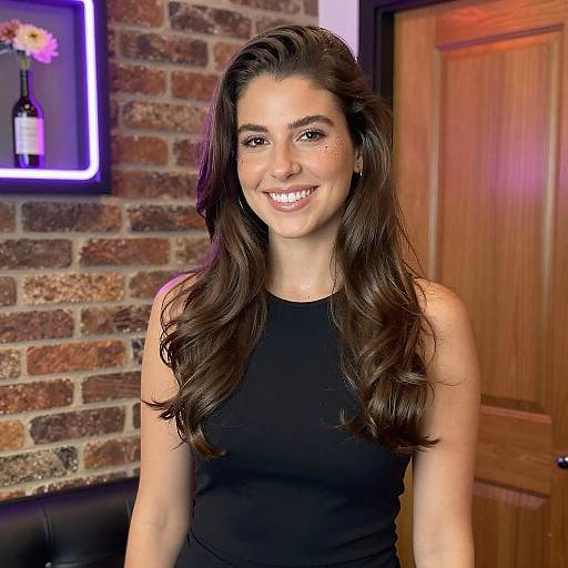 Smiling Young Woman with Glitter Makeup Against Brick Wall Background