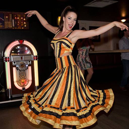 Woman Dancing in Retro Striped Dress Next to Vintage Jukebox