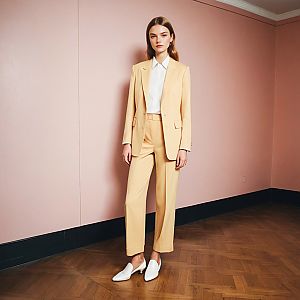 Confident Woman in Beige Suit