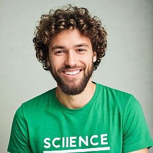 Young Man in Green T-Shirt Smiling