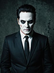 Man in Black Suit with Halloween Makeup