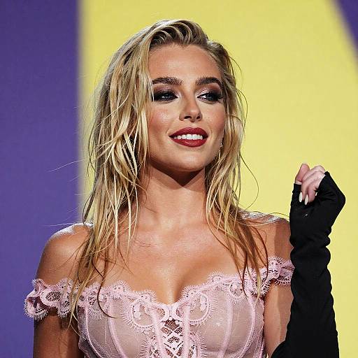 Blonde Woman in Sheer Pink Lace Top with Black Gloves