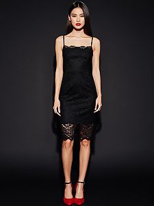 Elegant Black Lace Dress with Red Heels on Woman