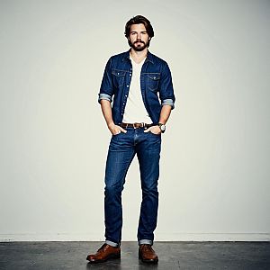 Confident Man in Casual Denim Outfit