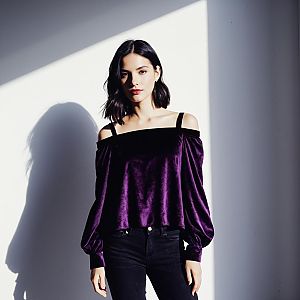 Elegant Woman Wearing Purple Velvet Off-Shoulder Top Fashion Portrait