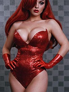 Glamorous Woman in Shimmering Red Bodysuit and Gloves