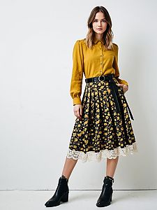 Woman in Mustard Yellow Blouse and Floral Midi Skirt with Lace Trim