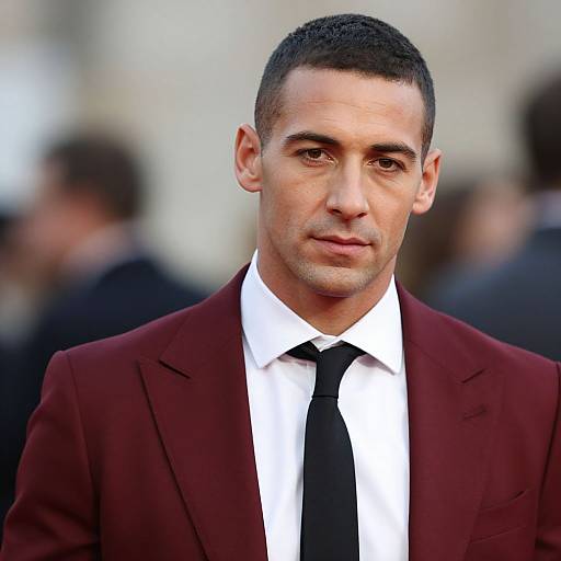Man in Maroon Suit with Black Tie Close-Up Portrait