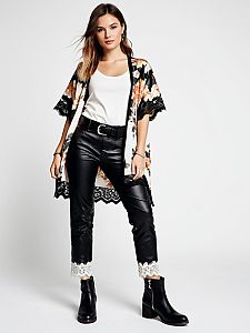 Fashionable Woman Wearing Leather Pants and Floral Kimono Outfit