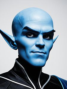 Photorealistic Megamind Cosplay Headshot of Man in Studio