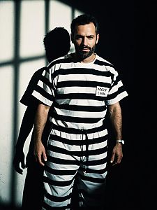 Photorealistic Portrait of Man in Vintage Prison Costume Black and White Stripes