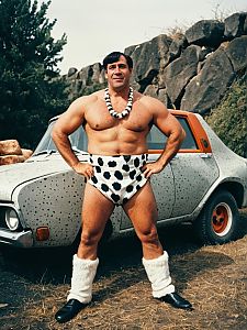 Man in Fred Flintstone Costume Humorous Editorial Cosplay Photo