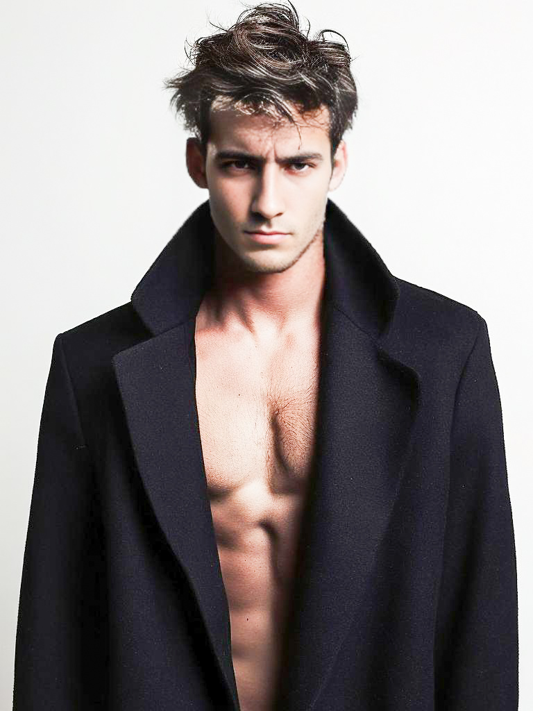 Male Model in Sleek Black Coat