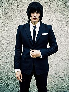 Man Cosplaying Bruno Bucciarati Costume Realistic Photo