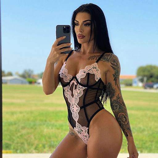 Tattooed Woman in Black and Pink Lace Bodysuit Outdoor Selfie