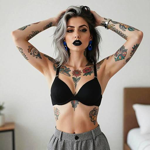 Tattooed Woman in Black Bra and Checkered Pants with Bold Makeup