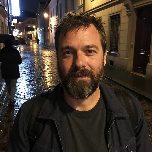 Bearded Man on Rainy Night Urban Street