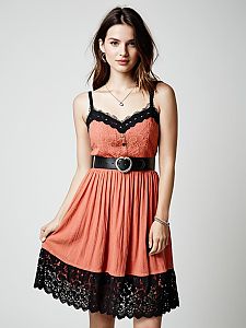 Woman in Casual Bohemian Coral Lace Sundress with Sleeveless Sweetheart Neckline