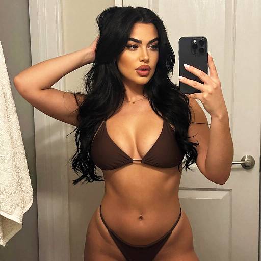 Confident Woman Taking Mirror Selfie in Brown Bikini