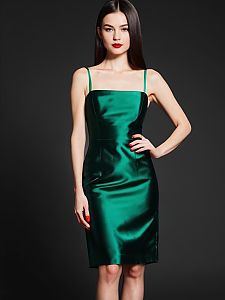 Elegant Woman Wearing Emerald Green Satin Dress in Studio