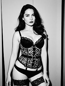 Woman in Black Lace Lingerie Corset and Stockings Fashion Inspired Role Play Costume