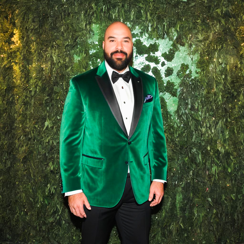 Confident Man in Green Velvet Blazer