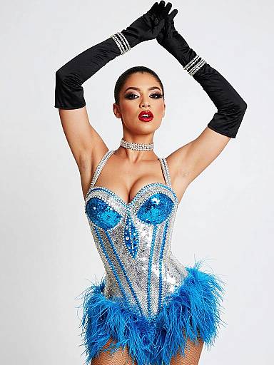 Glamorous Woman in Blue and Silver Burlesque Showgirl Costume