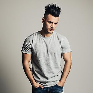 Young Man with Spiked Hair in Casual Attire