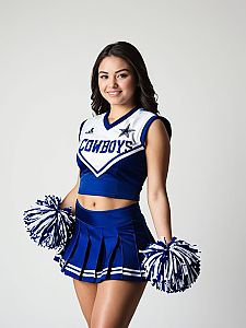 Young Woman in Blue and White Cheerleader Outfit with Pom-Poms