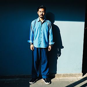 Confident Man in Blue Casual Attire