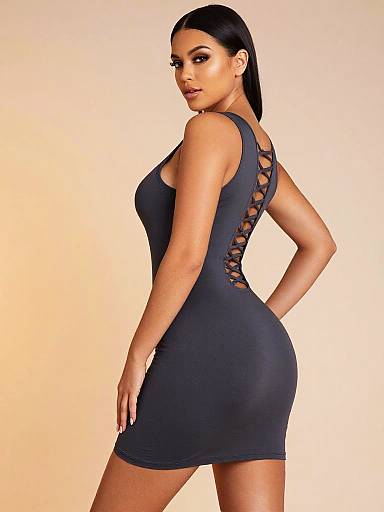Woman Wearing Gray Crisscross Back Mini Dress Side Pose
