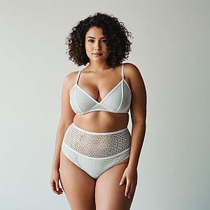 Confident Woman in White Mesh Lingerie Set Minimalistic Style