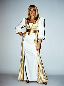 Woman in Vintage White and Gold Striped Formal Dress with Gold Belt