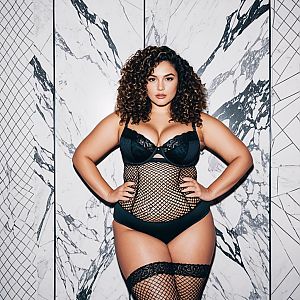 Confident Woman in Black Lingerie