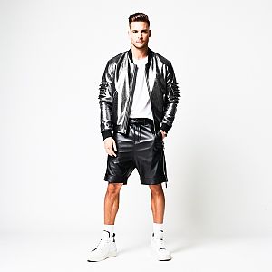 Confident man in black streetwear